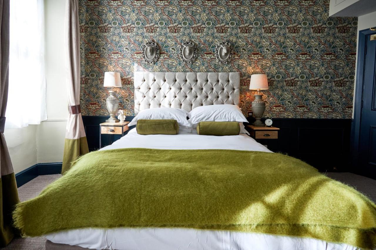 The Fleece At Cirencester Eksteriør bilde A bedroom at the hotel